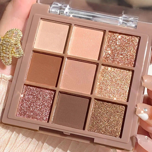 ✨ Palette Fards à Paupières Nude & Glitter – 9 Couleurs + Eyeliner Offert