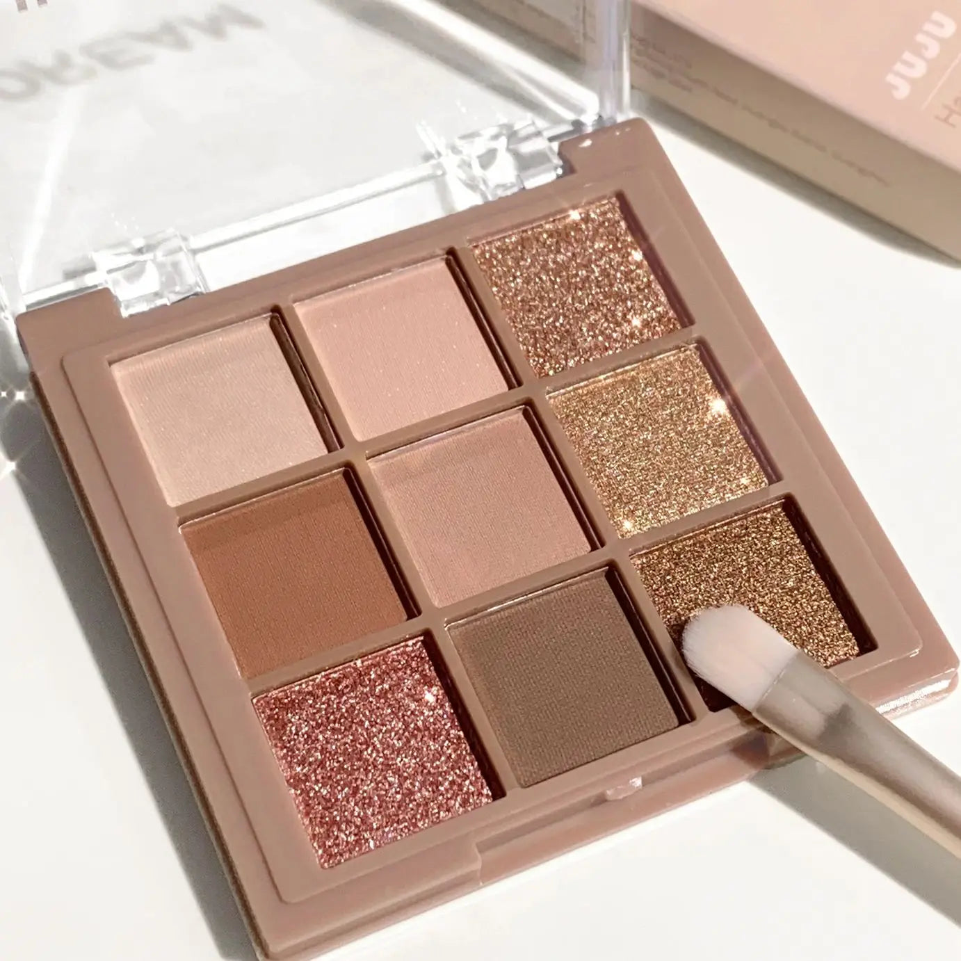 ✨ Palette Fards à Paupières Nude & Glitter – 9 Couleurs + Eyeliner Offert